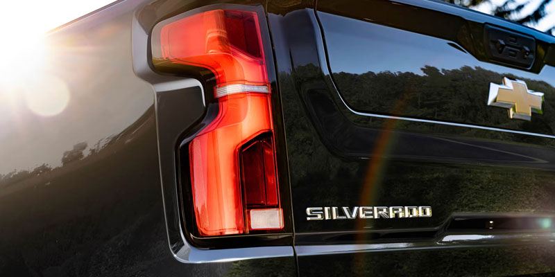 Bumper of a 2026 Chevrolet Silverado driving in Smithfield, NC
